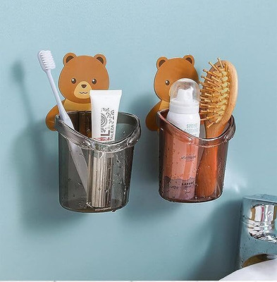 Radha Teddy Toothbrush Holder with Self Adhesive Sticker Unique Design Holder x1.1120 Plastic Toothbrush Holder(Grey, Pink, Wall Mount)