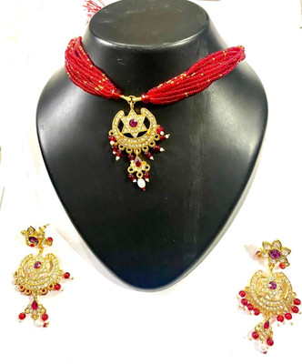NIKYANKA Brass Gold-plated Gold, Red Jewellery Set(Pack of 1)