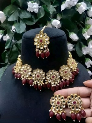 ARADHEMA Alloy Gold-plated Maroon Jewellery Set(Pack of 1)