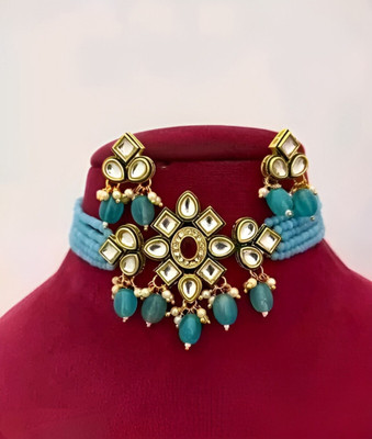 ARADHEMA Brass Gold-plated Beige Jewellery Set(Pack of 1)