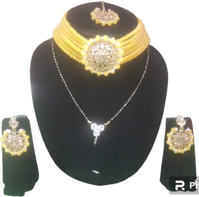 Ruhi Alloy Yellow Jewellery Set(Pack of 1)