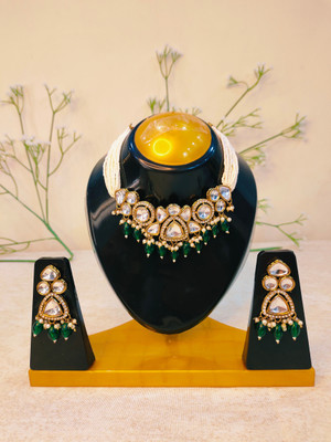 Ruvya Jewels Brass Gold-plated Green Jewellery Set(Pack of 1)