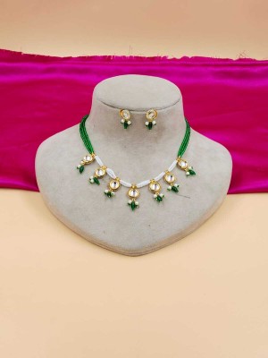 NIKYANKA Brass Gold-plated Green Jewellery Set(Pack of 1)