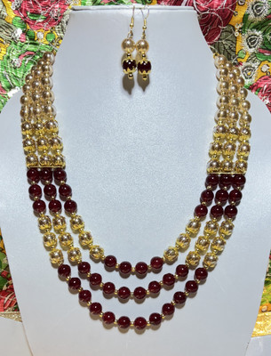 Radha Krishna Artificial Crystal Gold-plated Maroon Jewellery Set(Pack of 1)