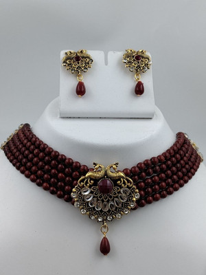 Niva Fashion Brass Gold-plated Maroon Jewellery Set(Pack of 1)