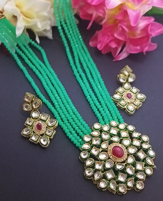 Henuka Copper Gold-plated Green, Gold, Red Jewellery Set(Pack of 1)