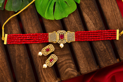 Tanusha Jewels Brass, Crystal Gold-plated Red Jewellery Set(Pack of 1)