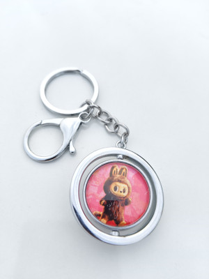 Achyuta Labubu silver-toned metal keychain featuring a circular, rotatable charm Key Chain
