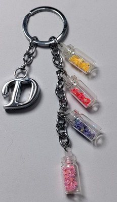 MOREL D ALPHABET METAL KEYCHAIN WITH COLORIZED SHINING STAR DRIFTING GLASS 4 BOTTLE Key Chain