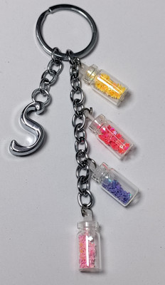 MOREL S ALPHABET METAL KEYCHAIN WITH COLORIZED SHINING STAR DRIFTING GLASS 4 BOTTLE Key Chain