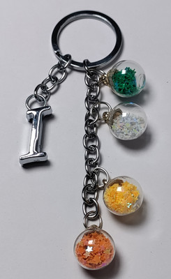 MOREL I ALPHABET KEYCHAIN WITH COLORIZED SHINING STAR DRIFTING GLASS 4 BOTTLE ROUND. Key Chain
