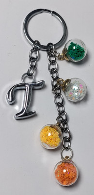 MOREL T ALPHABET KEYCHAIN WITH COLORIZED SHINING STAR DRIFTING GLASS 4 BOTTLE ROUND. Key Chain