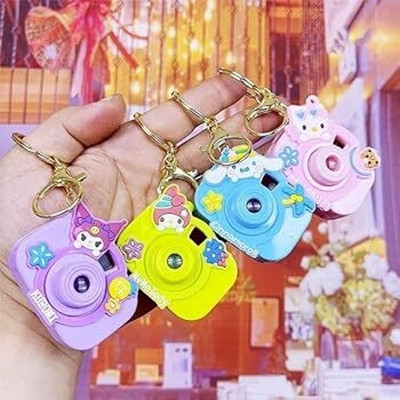 MARMORIS ECOM Camera Projector Light Cartoon Projection Key Chain- 1 Pc (Random Design Send) Key Chain