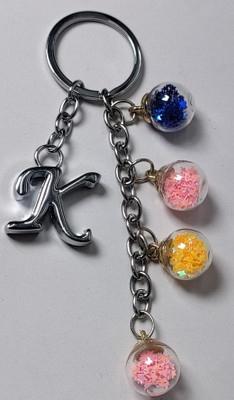 MOREL K ALPHABET KEYCHAIN WITH COLORIZED SHINING STAR DRIFTING GLASS 4 BOTTLE ROUND. Key Chain