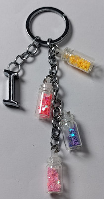 MOREL I ALPHABET METAL KEYCHAIN WITH COLORIZED SHINING STAR DRIFTING GLASS 4 BOTTLE Key Chain
