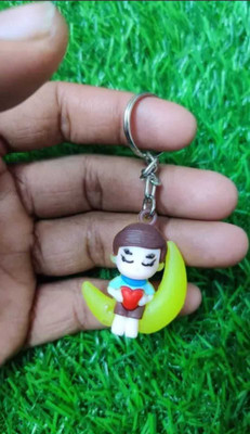 Neha Boy sitting on moon with holding herat Silicone keychain Pack Of 1 Key Chain