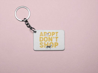 DOGAR ESSENTIALS Adopt, don't shop Yellow Text -Printed Acrylic Keychain (Pack Of 2) Key Chain