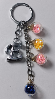 MOREL E ALPHABET KEYCHAIN WITH COLORIZED SHINING STAR DRIFTING GLASS 4 BOTTLE ROUND. Key Chain