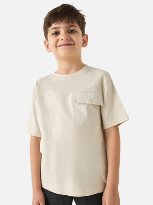 JUNIORS by Babyshop Boys Solid Cotton Blend Regular T Shirt(Beige, Pack of 1)