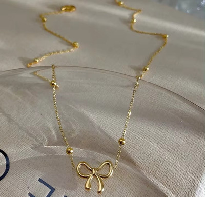 Dhrti Bling Golden Bow Charm Necklace Gold-plated Plated Stainless Steel Chain