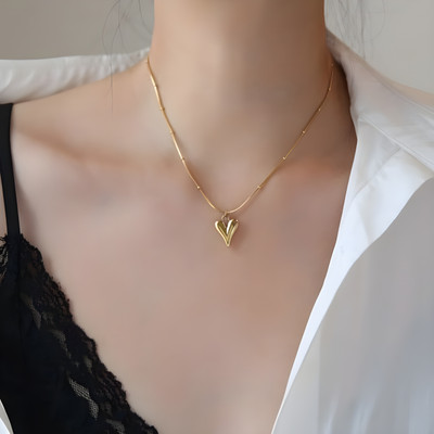 HOLLOW HEART Gold-plated Stainless Steel Pendant