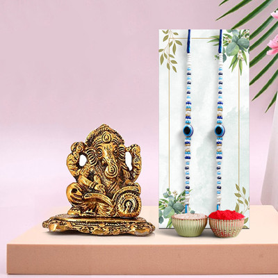 Ascension Designer Evil Eye Designer Rakhi With Ganesh Ji Statue & Roli Tilak Assorted Rakhi, Chawal Roli Pack Set(2 Evil Eye Designer Rakhi for Brother, 1 Metal Ganesh Ji Statue, & Roli Tilak Set) Ascension Designer Evil Eye Designer Rakhi With Ganesh Ji Statue & Roli Tilak Assorted Rakhi, Chawal Roli Pack Set(2 Evil Eye Designer Rakhi for Brother, 1 Metal Ganesh Ji Statue, & Roli Tilak Set)