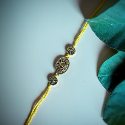Shubh Sukkhi Religious Handmade Oxidised OM With Tree Design Mauli Thread Rakhi  Set(1 rakhi)