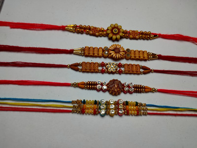 PDR Poonam Designer PD-Rakhi-163 Plastic (PVC) Chawal Roli Pack  Set(5)