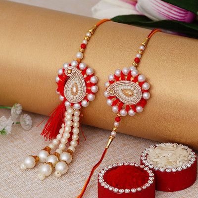 eCraftIndia Bhaiya Bhabhi Rakhi Assorted, Zardosi, Pearl Chawal Roli Pack, Rakhi, Greeting Card  Set(1 Bhaiya Bhabhi Rakhi, 1 Roli Tikka Matki, Best Wishes Greeting Card)
