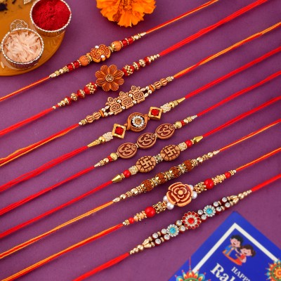 Pride Art Religious Pack of 10 Rakhis for whole Family with Roli Chawal, Rakhi for Bro, Brother Mauli Thread, Pearl Rakhi, Greeting Card, Chawal Roli Pack  Set(Pack of 10 Rakhis comes with Roli and Chawal, 1 Greeting Card)