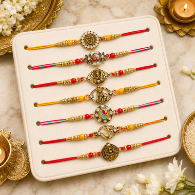 Designer Rakhi-56 Assorted Rakhi, Chawal Roli Pack, Greeting Card Set by Dreamica(7 Designer Rakhi, 1 Roli Chawal Pack, 1 Greeting Card)