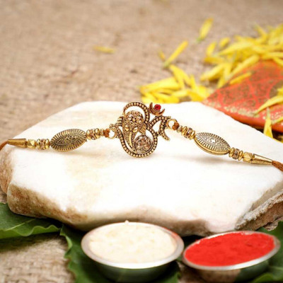 Religious Rakhi Gold Finish Chawal Roli Pack, Rakhi Set by Flipkart SmartBuy(1 Rakhi with Roli, Chawal)