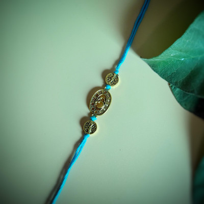 Shubh Sukkhi Religious Handmade Oxidised OM With Tree Design Mauli Thread Rakhi  Set(1 rakhi)