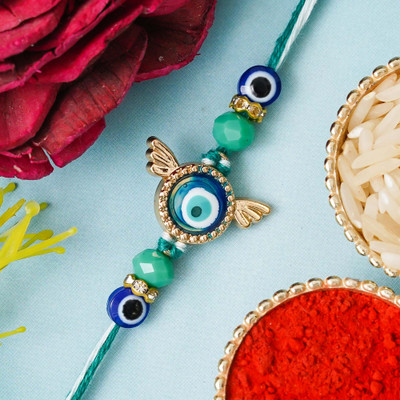eCraftIndia Designer Rakhi Assorted Rakhi  Set(1 Designer Rakhi, 1 Roli Chawal Pack)