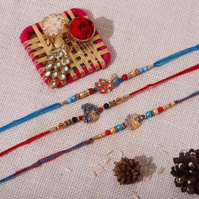 True Decor Designer Set Of 3 Peacock Jarkan Rakhi Assorted Chawal Roli Pack  Set(3 Rakhi::1 Pack Roli Chawal)