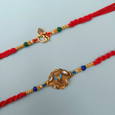 Eleven Craft Bhaiya Bhabhi RKO1G1 Assorted Chawal Roli Pack  Set(Combo of 2 Handmade Rakhis – Om & Ganesha design)