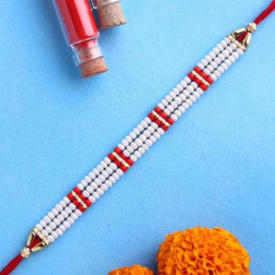 FNP Thread GIFTSFNP18649_RK21 Mauli Thread Rakhi  Set(3)