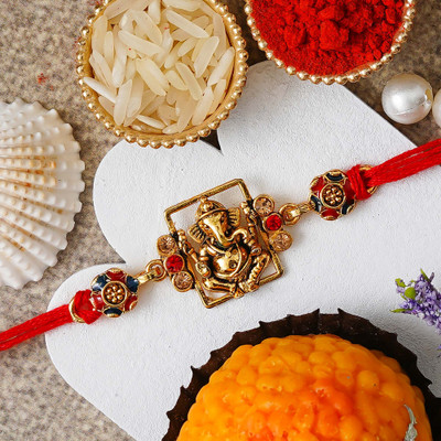 eCraftIndia Religious Rakhi Assorted Rakhi  Set(1 Religious Rakhi, 1 Roli Chawal Pack)