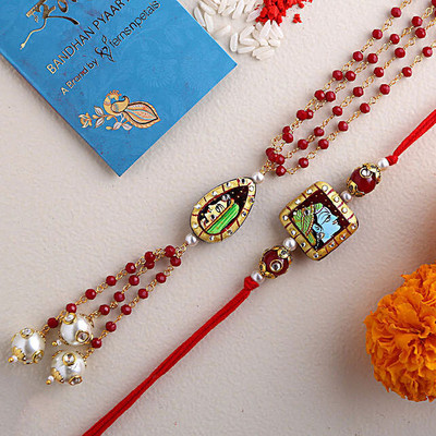FNP Bhaiya Bhabhi GIFTSFNP28312_RK24 Mauli Thread Rakhi  Set(4)