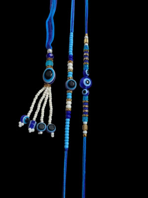 Togline Seed Macrame UNIQUE EVIL EYE lumba and 2 rakhi set with roli chawal-D003 Yarn, Sandalwood, Kundan, Assorted, Mauli Thread Rakhi, Lumba  Set(1 lumba,2 rakhi combo set with roli chawal)