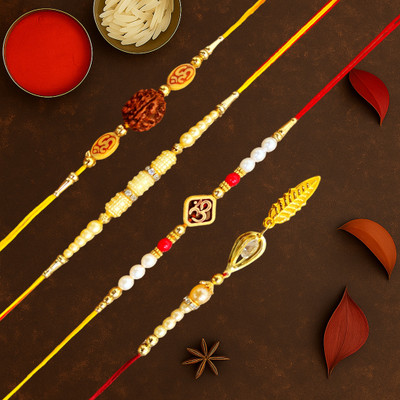 Cyan Collection Handcrafted Religious Rakhi Combo for Bhaiya Bhabhi – Rudraksha Om Beads Pearl & Golden Leaf Mauli Thread Rakhi  Set(3 Dora Rakhi 1 Lumba Rakhi Roli Chawal)