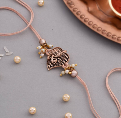AVM Designer AM-Krishna Face Rakhi 1 Piece For Brother With Roli Chawal Set Assorted Rakhi  Set(1 Piece Krishna Rakhi with Roli Chawal Pack for Mens, Brother & Kids)