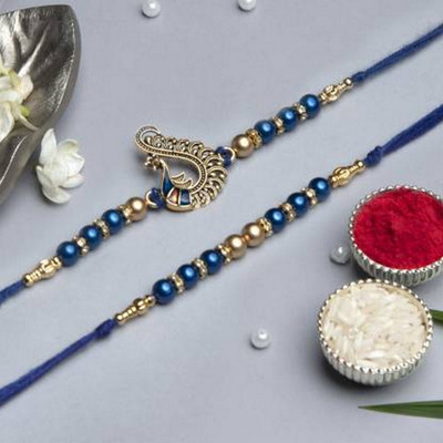Flipkart SmartBuy Designer Rakhi Assorted Chawal Roli Pack, Rakhi  Set(2 Rakhi::Roli::Chawal)