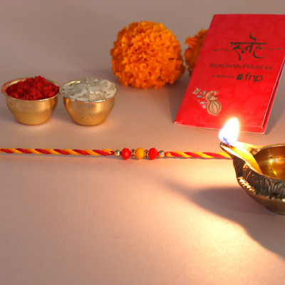 FNP Thread GIFTSFNP28494_RK24 Mauli Thread Rakhi  Set(3)