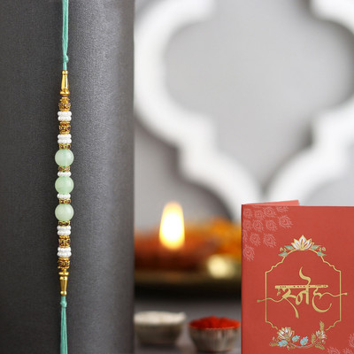 FNP Thread GIFTSFNP28315_RK24 Mauli Thread Rakhi  Set(3)