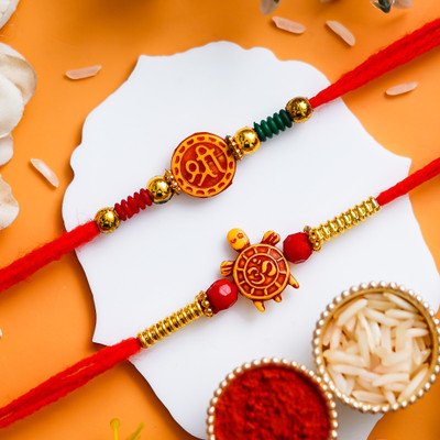 Poorak Religious 23RK_10RA_CR Assorted Rakhi  Set(2 Rakhi, 1 Roli Chawal Set, 1 Greeting Card)