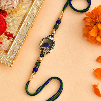 Voylla Thread Peacock Feather Beaded Single Rakhi Mauli Thread Chawal Roli Pack  Set(Pack of 1)
