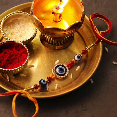 Shubhanjali Thread Crystal Red Onyx Beads Bracelet Rakhi for Bhai Evil Eye Round Charm Rakhi Combo Mauli Thread Chawal Roli Pack  Set(Crystal Red Onyx Beads Bracelet Rakhi for Bhai Evil Eye Round Charm Rakhi Combo)
