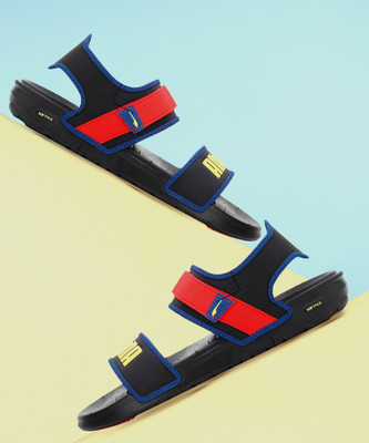 PUMA SOFTRIDE SANDAL X 1DER Men Sandals(Black , 10)