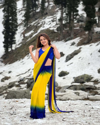 KHODIYAR ENTERPRIES Color Block Bollywood Georgette Saree(Yellow, Blue)